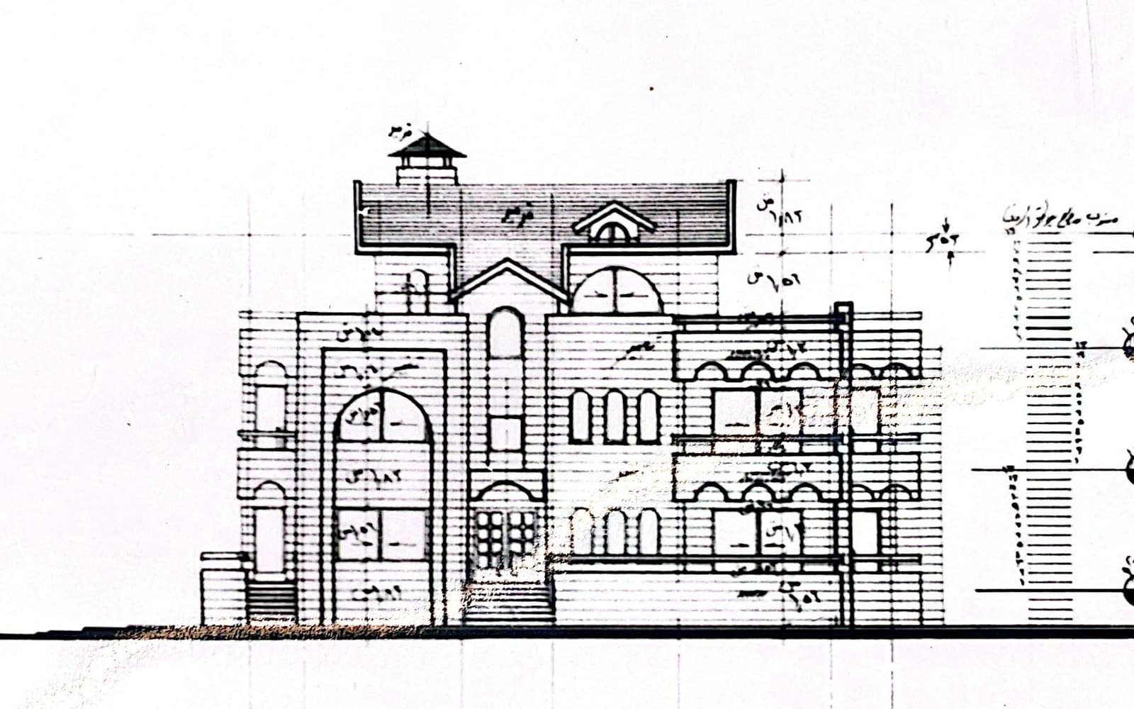 Hand-drawn front elevation of a cream-stone villa, rooftop turret, central dome and arcaded wing, by Eng. Nabil El Massri